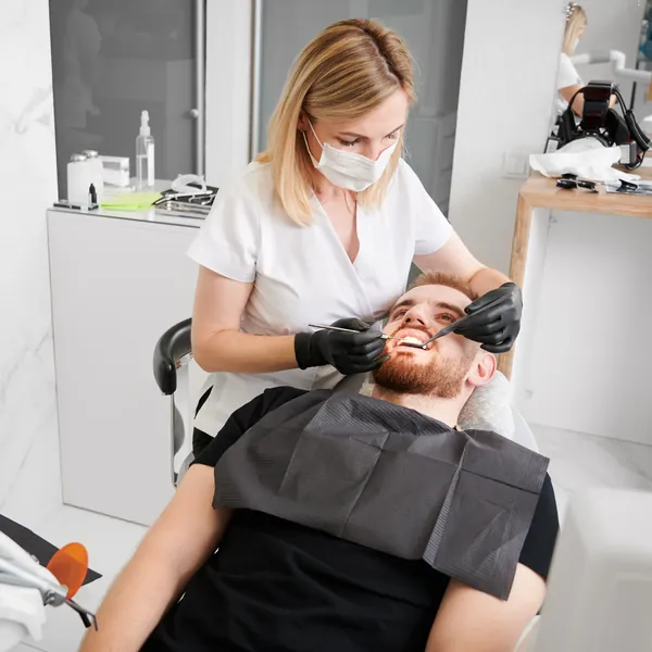 Smiling patient at a dental checkup