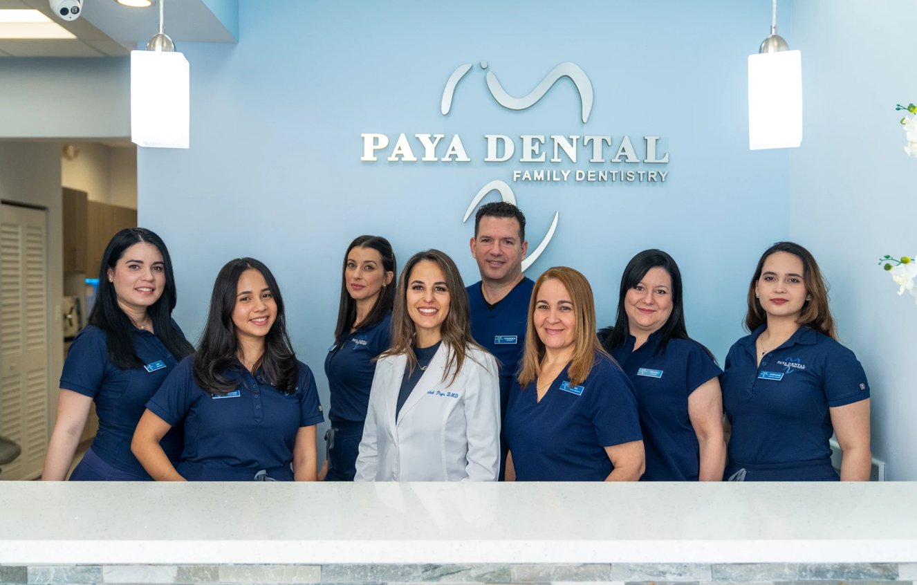 Paya Dental team at the front desk