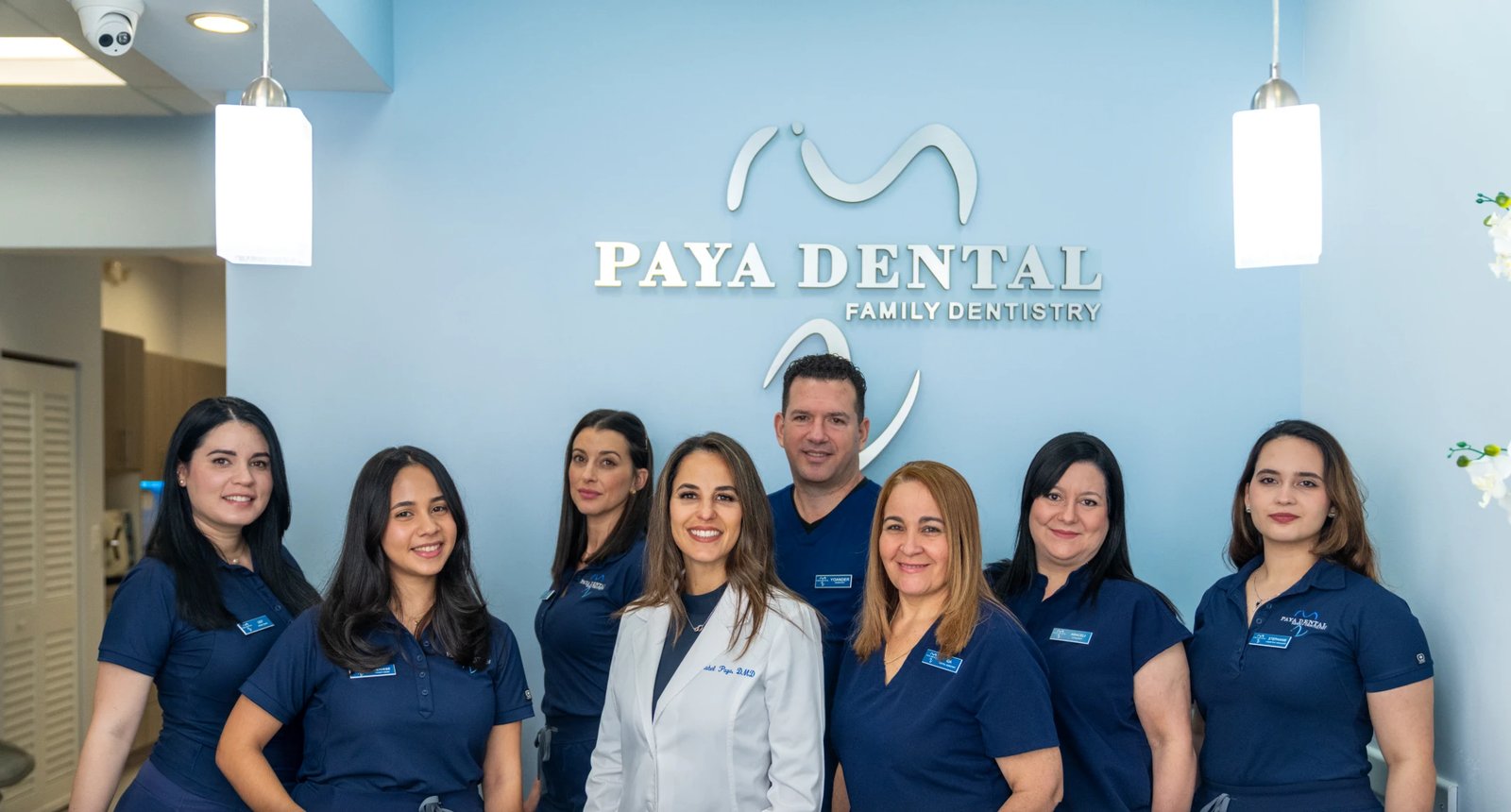 The Paya Dental team at the reception desk