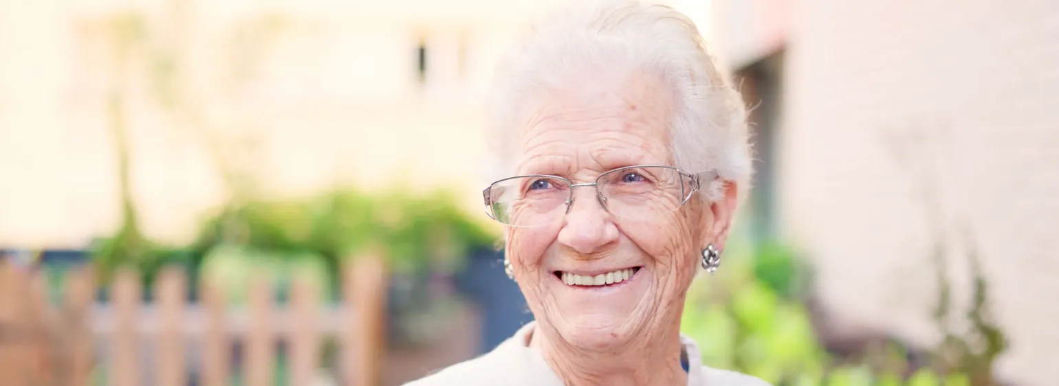 Smiling senior woman outdoors