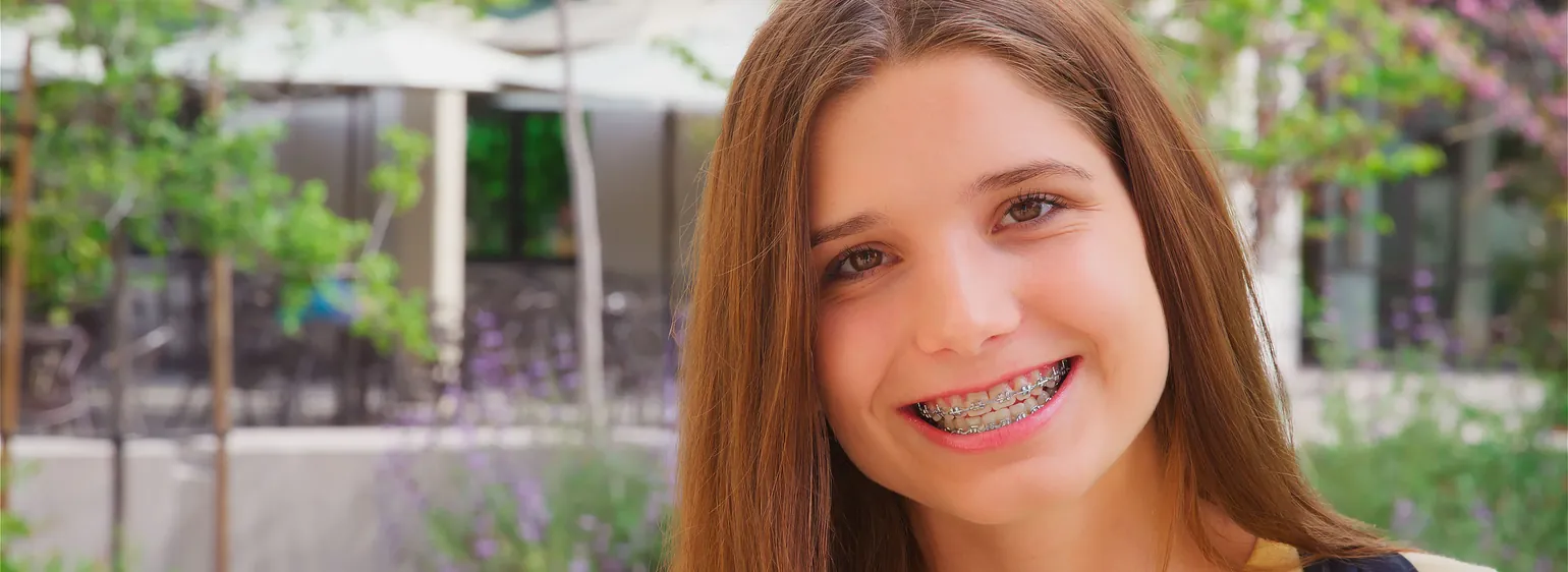 Teenage girl smiling with braces