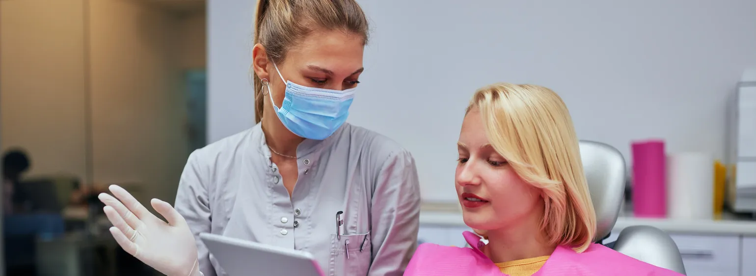 Dentist reviewing the treatment plan with a patient