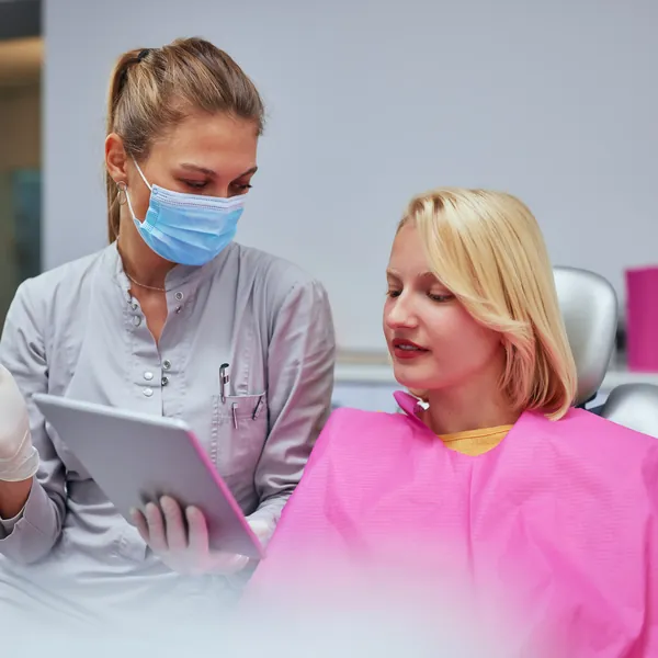 Dentist reviewing the treatment plan with a patient