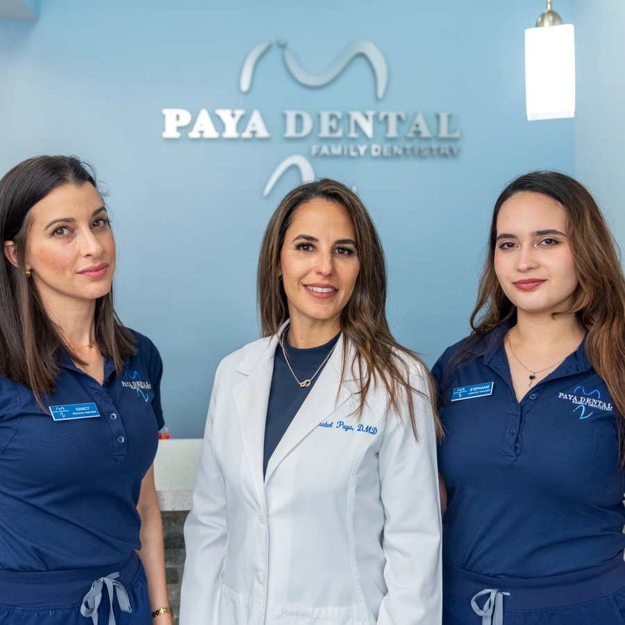 Paya Dental doctors at the front desk